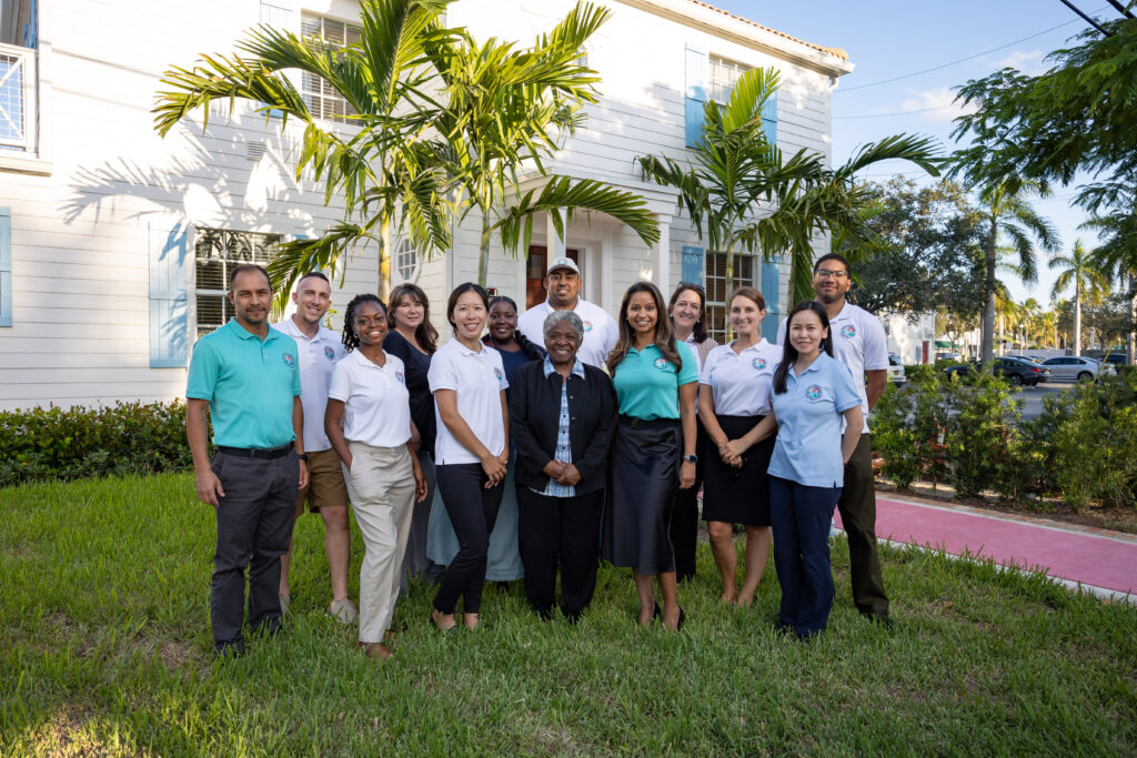 Delray Beach CRA Staff posing in front of the Wellbrock House